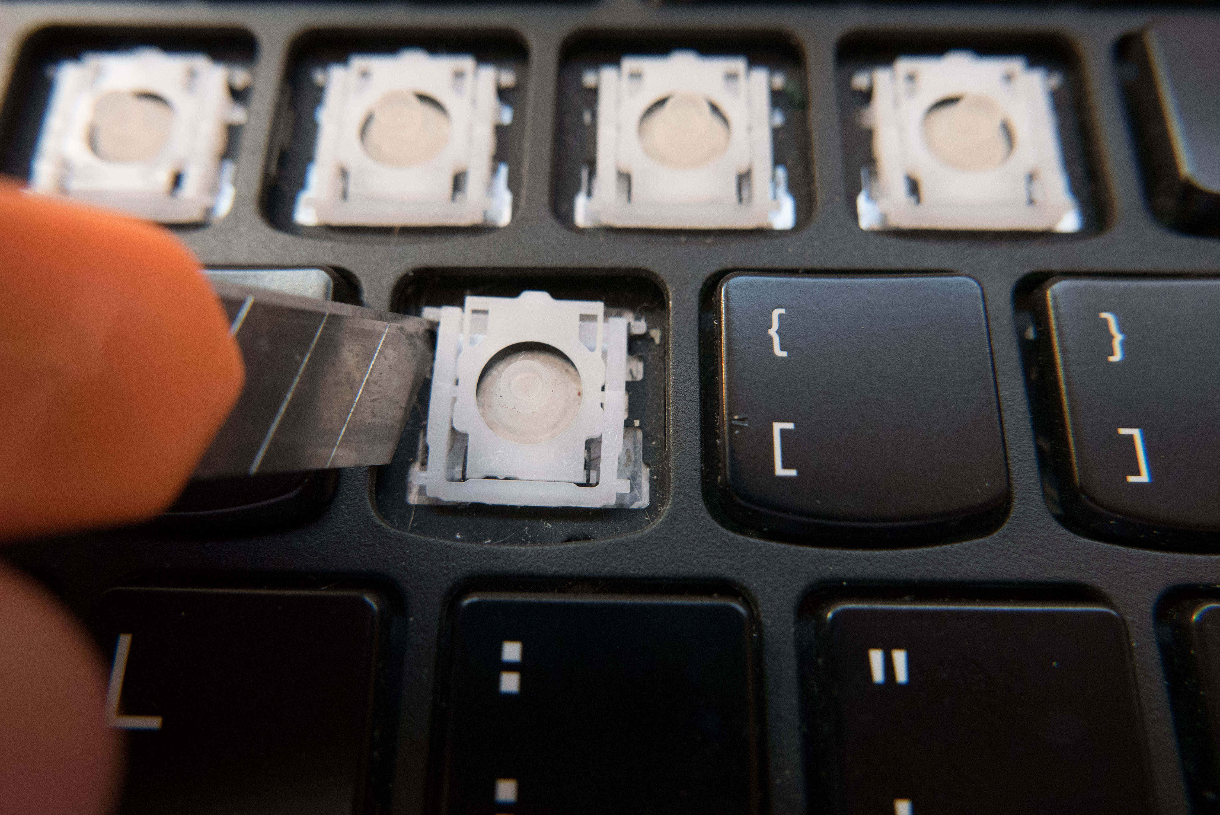 Image result for removing the laptop keycaps